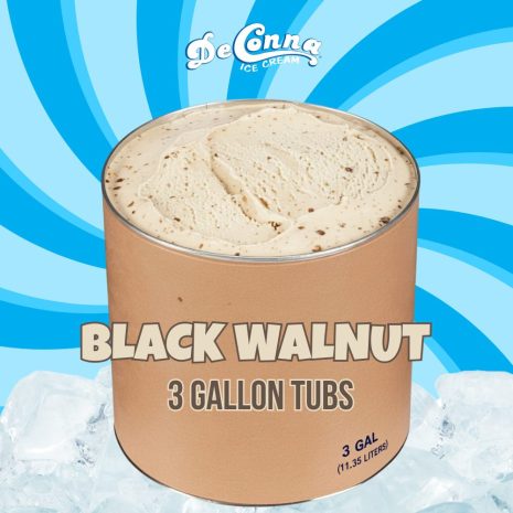DeConna black walnut ice cream in a 3 gallon tub, creamy beige with nut pieces, sitting on ice