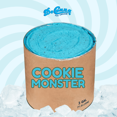 Cookie Monster ice cream in a 3 gallon DeConna tub with bright blue base and tiny chocolate cookie crumbs.